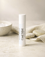 Mint Natural Beeswax Lip Balm In White BPA Free Plastic Push Up Tube