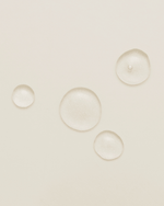 Clear gel cleanser texture on neutral beige background