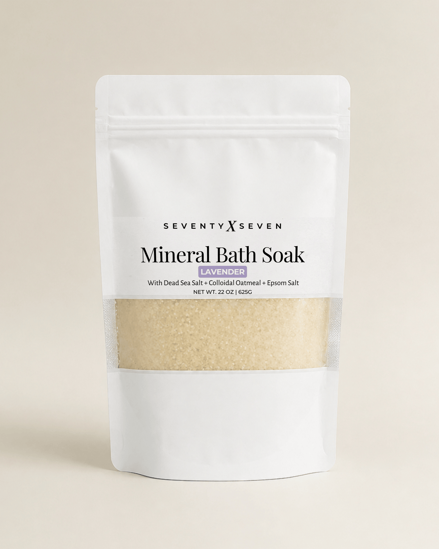 Lavender mineral bath soak in white mylar bag with window on neutral backdrop
