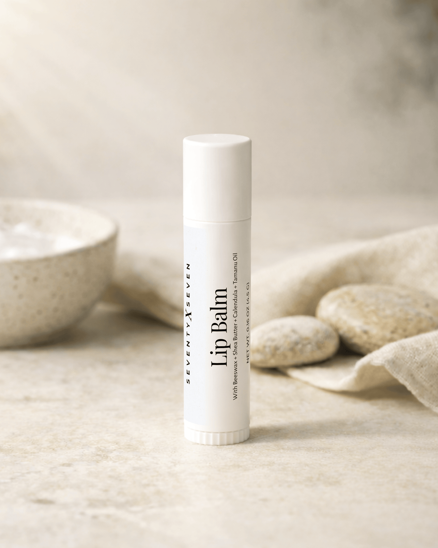Natural beeswax lip balm in white BPA free tube